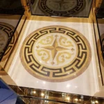 پنل سنگ معرق مدالیون طلایی با قاب یونانی